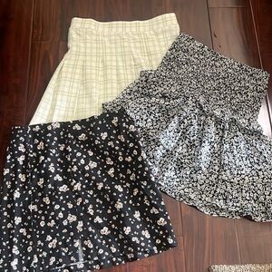 Lot of three girls skirts size s-m, green, black, foral